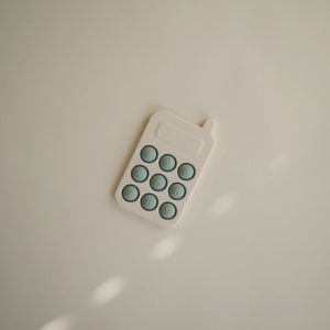 MUSHIE - PRESS TOY PHONE - Cambridge Blue